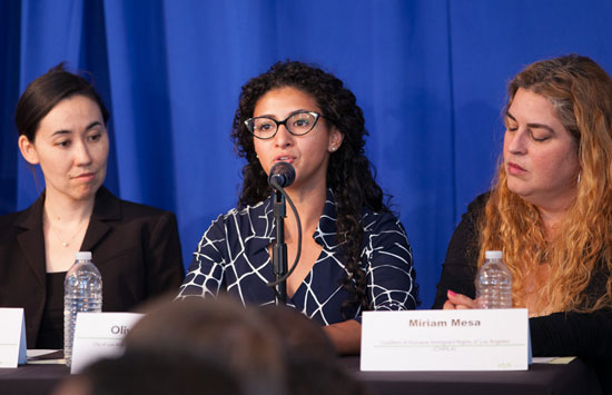 Photo of Olivia Calderon talking about financial empowerment efforts for low-income and unauthorized immigrants